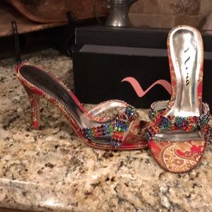 31/2 inch paisley fabric and jeweled heels.